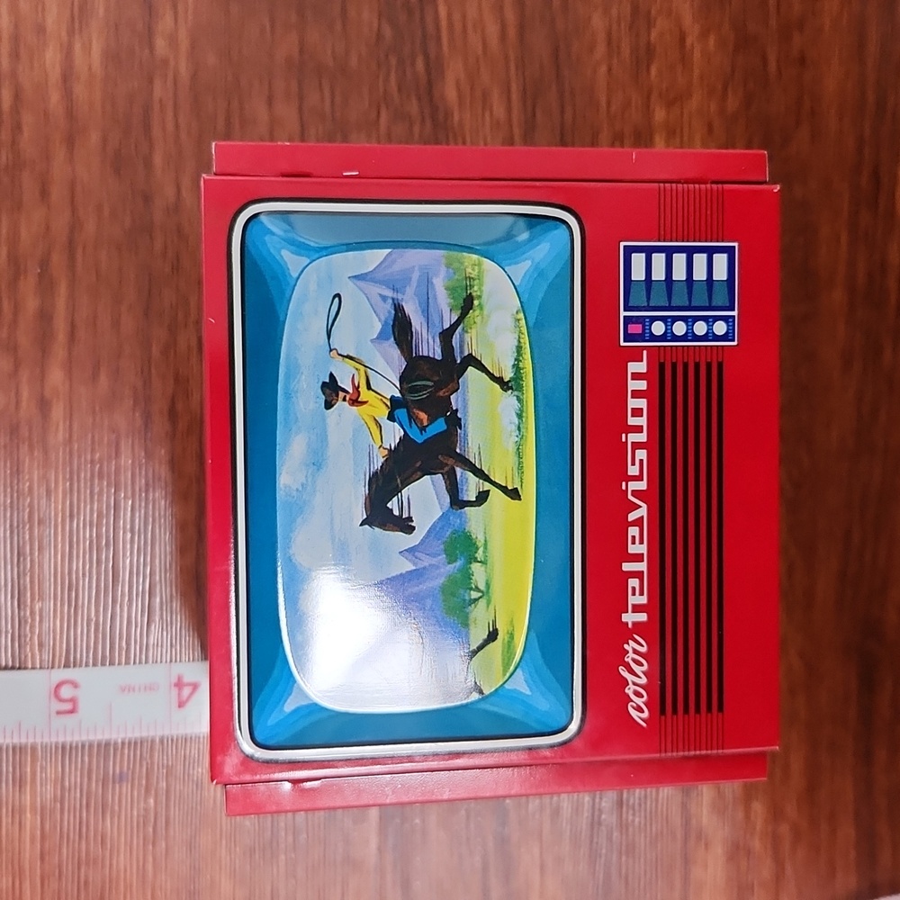 "Color television" retro tin bank